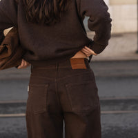 sustainable brown washed denim jeans