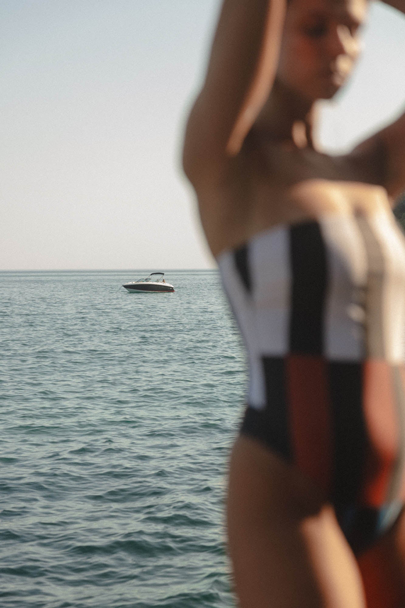 conscious x sienna sustainable swimwear swimsuit midnight stripes