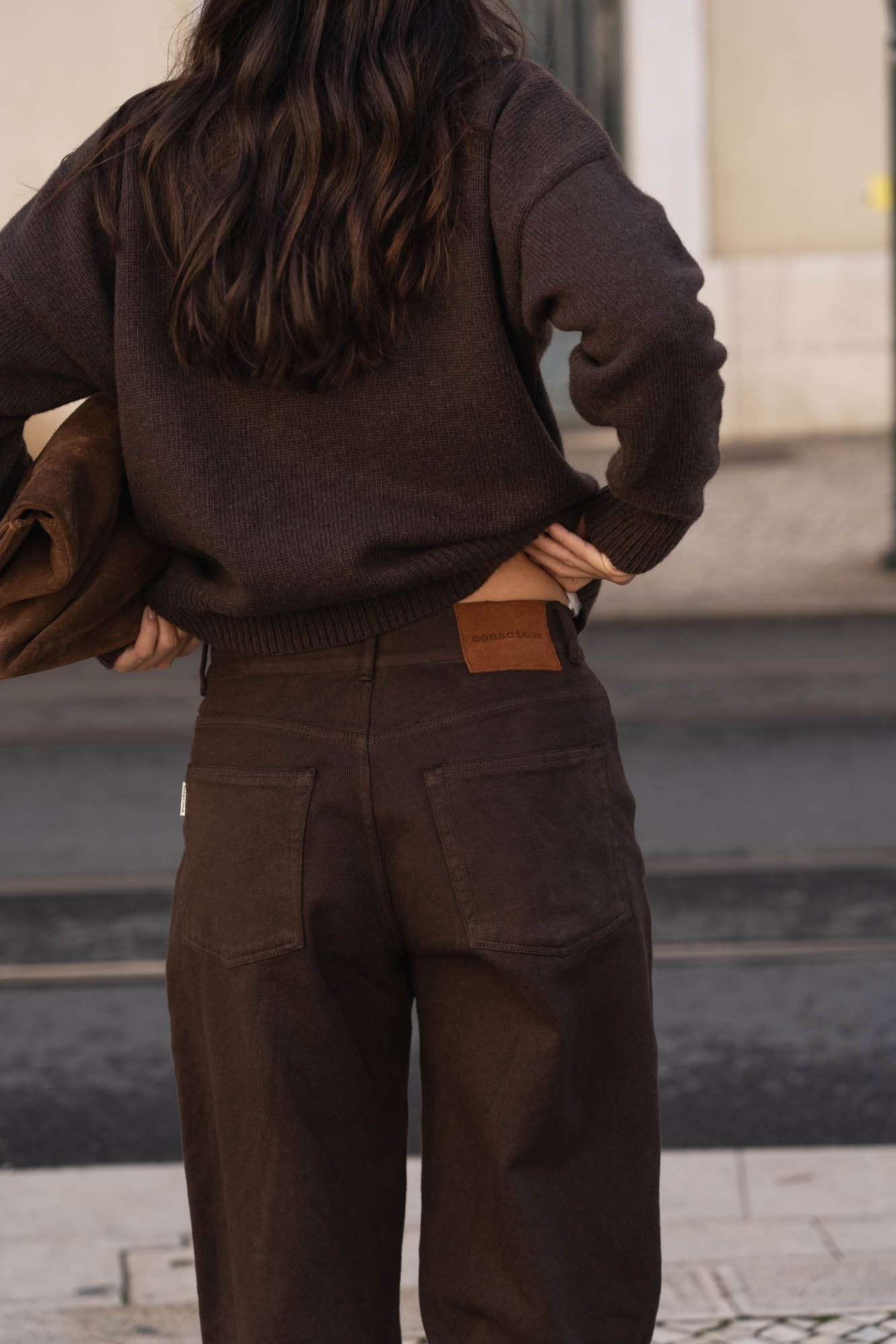 sustainable brown washed denim jeans